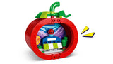 LEGO tomato head model opened to show a small interior build with a mini tomato face