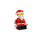 LEGO Up-Scaled Santa Minifigure 40820 seated with legs extended forward