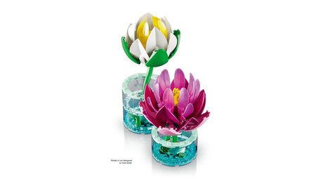 Angled view of LEGO Water Lilies with white flower behind pink flower in transparent blue bases