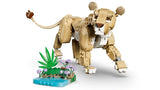 LEGO lioness model beside a small water and flower habitat build