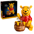 LEGO Winnie the Pooh 43300 display model with Hunny pot, bees and product box shown beside the seated Winnie the Pooh figure