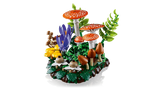 Side view of LEGO Woodland Mushrooms display with red mushrooms, flowers and foliage