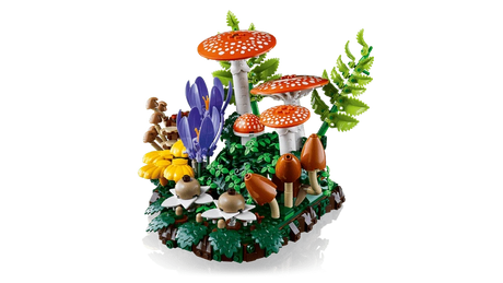 Side view of LEGO Woodland Mushrooms display with red mushrooms, flowers and foliage
