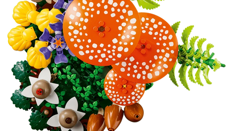 Top view of LEGO Woodland Mushrooms display with red mushrooms, purple crocuses and yellow flowers