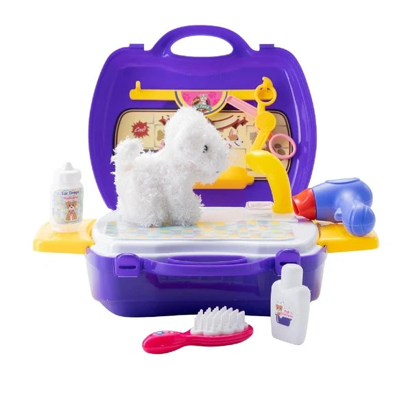 Open Peterkin Little Pet Parlour Carry Case showing the white plush puppy, toy hair dryer, brush, grooming bottles, yellow shower attachment and purple storage case