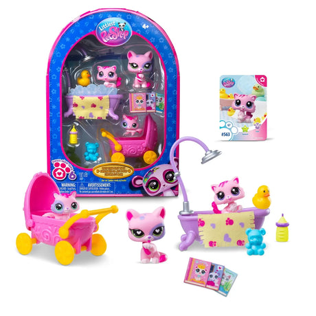 Littlest Pet Shop Bath Time Play Pack retail packaging displayed with three pink and white cat figures, pink baby pram, purple bathtub, yellow rubber duck and miniature accessories.