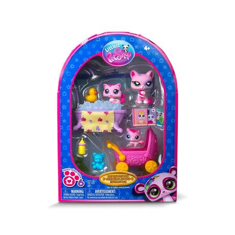 Front of Littlest Pet Shop Bath Time Play Pack packaging with three cat figures, pink bathtub, yellow rubber duck, baby bottle and other accessories visible inside.