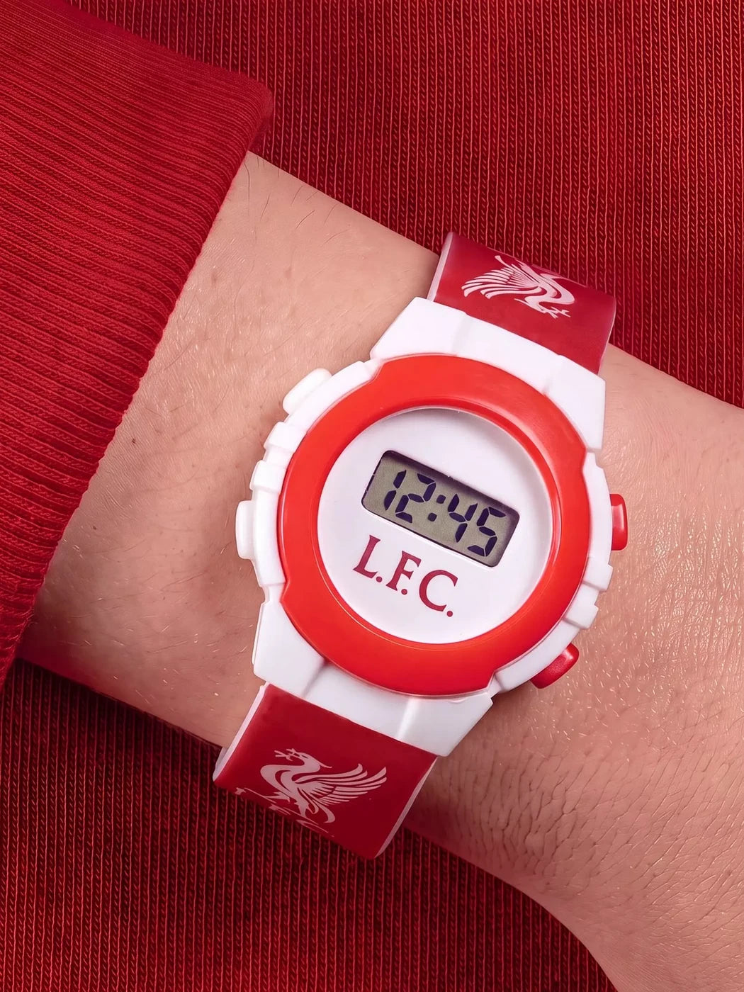 Liverpool FC Digital Watch worn on the wrist showing the red strap, white and red case and digital time display