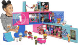 LOL Surprise Fashion Show House open showing dolls, rooms, furniture, and pink slide playset