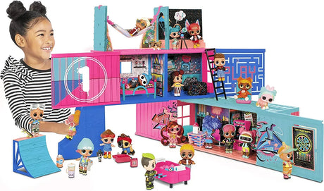LOL Surprise Fashion Show House open showing dolls, rooms, furniture, and pink slide playset