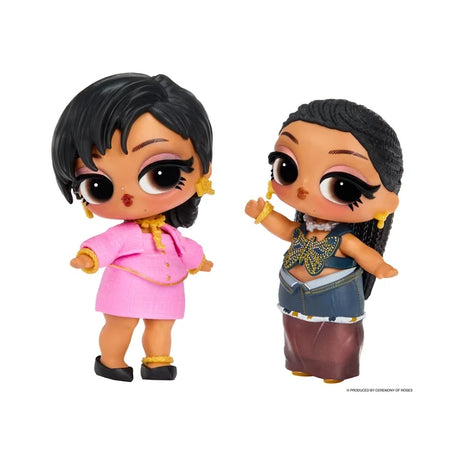 Two L.O.L. Surprise Music Festival Headliners Tots dolls, one with short black hair wearing a pink jacket and skirt with gold accessories, and the other with braided black hair wearing a blue butterfly patterned top and long skirt.
