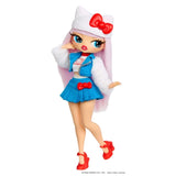 Full length view of the L.O.L. Surprise O.M.G. Hello Kitty doll posing with one hand near her face, wearing a white hat with red bow, blue pleated skirt, white fluffy sleeves and red high heels decorated with bows.