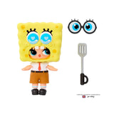 L.O.L. Surprise SpongeBob SquarePants Tot with yellow SpongeBob costume head and separate accessories, including novelty glasses and a spatula.
