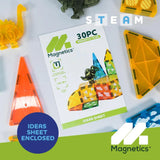 Magnetics Dinosaur Expansion Set idea sheet shown with translucent magnetic tiles and small dinosaur figure around it