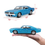 Maisto 1969 Dodge Charger R/T with model dimensions and hand size reference