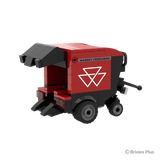 BRIXIES Plus Massey Ferguson RB F round baler with the rear chamber opened, exposing the internal red and black baler components