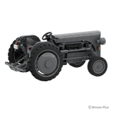 Rear angled view of the BRIXIES Plus Massey Ferguson TEA 20 showing the rear linkage, steering wheel, seat, large rear tyre and exposed side engine details