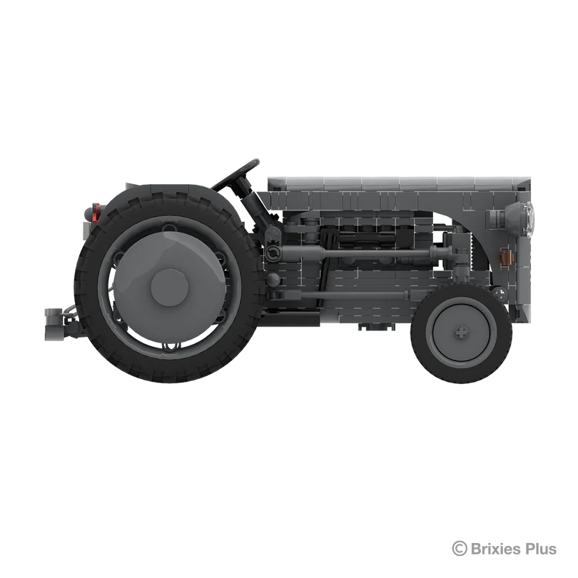BRIXIES Plus Massey Ferguson TEA 20 shown in full side profile with the rear hitch, open driving position, grey bodywork and agricultural tyres visible
