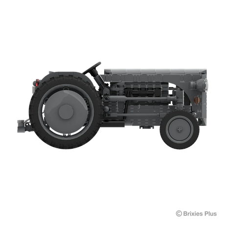 BRIXIES Plus Massey Ferguson TEA 20 shown in full side profile with the rear hitch, open driving position, grey bodywork and agricultural tyres visible