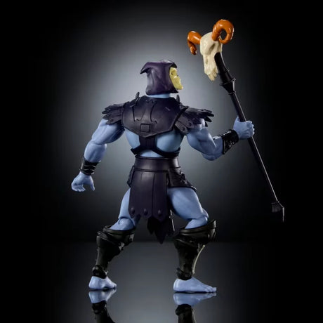 Masters of the Universe Skeletor action figure shown from the rear holding a ram headed staff