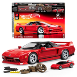 Hot Wheels Acura NSX box with built red model, small diecast car, wheel covers and accessories