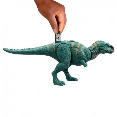 Majungasaurus toy shown with scanning app code on back for gameplay – Ireland