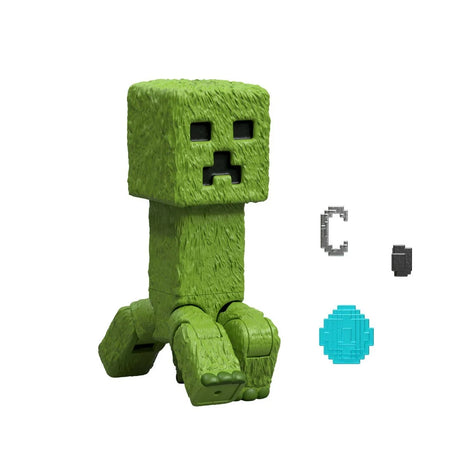 Minecraft Movie Creeper posed on all four legd with accessories beside – Ireland