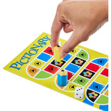 Hand moving a yellow mover on the Pictionary gameboard with die and card box nearby
