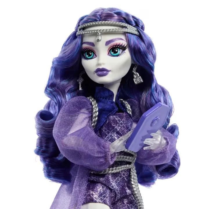 Closeup of Spectra Vondergeist doll with purple hair and tablet – Ireland