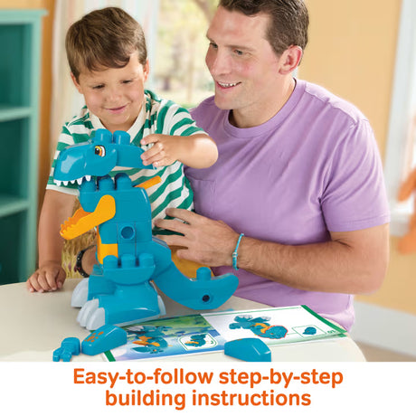 MEGA BLOKS Build & Chomp Dinosaur model being assembled by a child and adult over an open instruction booklet.