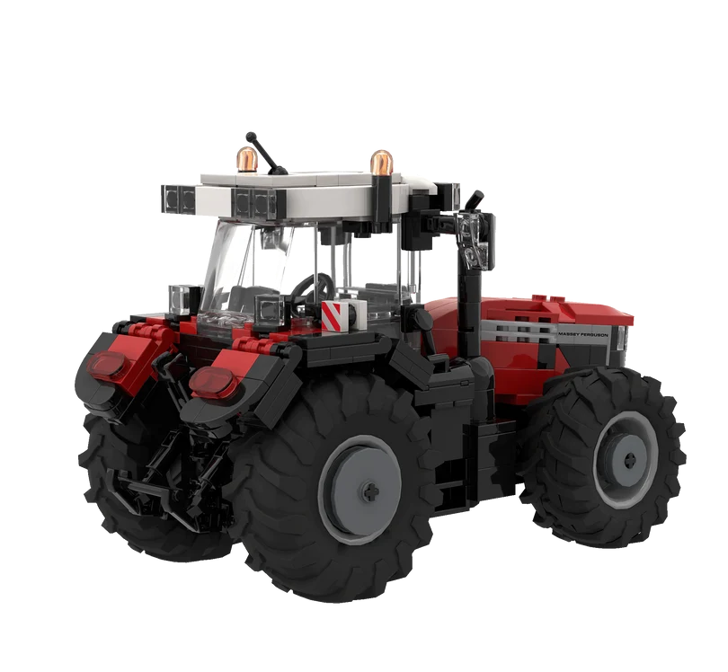 Rear left view of the BRIXIES Plus Massey Ferguson 9S showing the cab, rear linkage, large rear wheel and red rear bodywork
