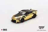Mini GT Nissan Z VeilSide FFZ400 Gold Chrome front three quarter view showing the patterned black bonnet, gold front bumper, black splitter, side vents and five spoke wheels