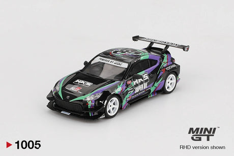 Mini GT Toyota GR86 HKS Type R front three quarter view showing the black bonnet with HKS branding, purple and green graphics, white wheels, front splitter and large rear wing