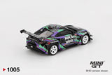 Rear three quarter view of Mini GT Toyota GR86 HKS Type R showing the large rear wing, black rear diffuser, white racing wheels, colourful side graphics and illustrated roof