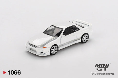 Mini GT Nissan Skyline GT-R R32 VeilSide Combat C-I White front three quarter view showing the modified front bumper, silver five spoke wheels, VeilSide bonnet graphics and raised rear spoiler