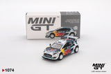 Mini GT Ford Puma Rally1 No.16 M-Sport Ford WRT 2024 Rally Finland diecast car with Red Bull racing graphics, white rally wheels and large rear wing, displayed in front of its Mini GT collector box
