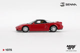 Side profile of Mini GT Honda NS-X 1989 Ayrton Senna showing red bodywork, black roof, silver five spoke wheels, side air intake and helmeted driver figure inside