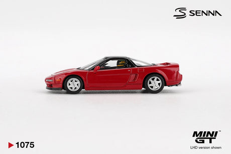 Side profile of Mini GT Honda NS-X 1989 Ayrton Senna showing red bodywork, black roof, silver five spoke wheels, side air intake and helmeted driver figure inside