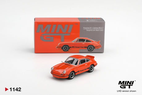 Mini GT Porsche 911 Carrera RS 2.7 Tangerine with Black Livery diecast car displayed in front of its MINI GT collector box, showing black Carrera graphics, black wheels and ducktail rear spoiler. LHD version shown.