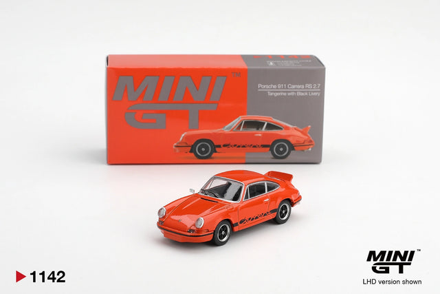 Mini GT Porsche 911 Carrera RS 2.7 Tangerine with Black Livery diecast car displayed in front of its MINI GT collector box, showing black Carrera graphics, black wheels and ducktail rear spoiler. LHD version shown.