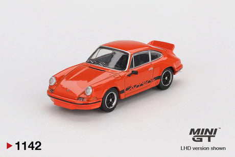 Front three quarter view of Mini GT Porsche 911 Carrera RS 2.7 in Tangerine orange, showing round headlights, black front bumper trim, Carrera side graphics, black wheels and ducktail spoiler. LHD version shown.