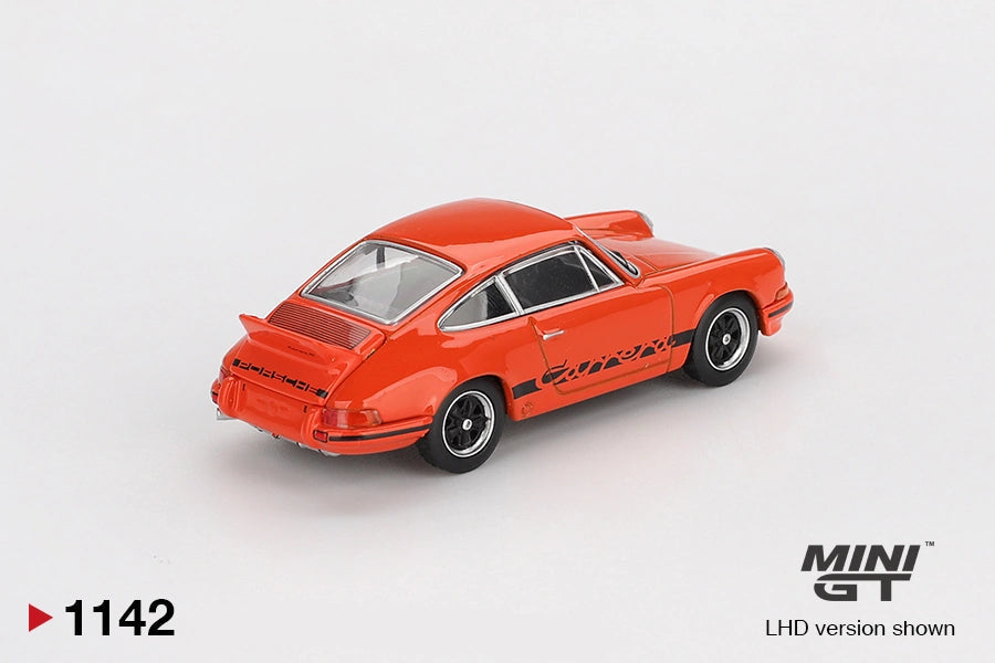 Rear three quarter view of Mini GT Porsche 911 Carrera RS 2.7 showing Tangerine bodywork, black Porsche lettering, rear engine grille, ducktail spoiler and black Carrera side graphics. LHD version shown.