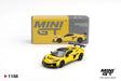 Mini GT Chevrolet Corvette ZR1 Accelerate Yellow LHD diecast car with black wheels, vented bonnet and large rear wing, displayed in front of its MINI GT collector box.