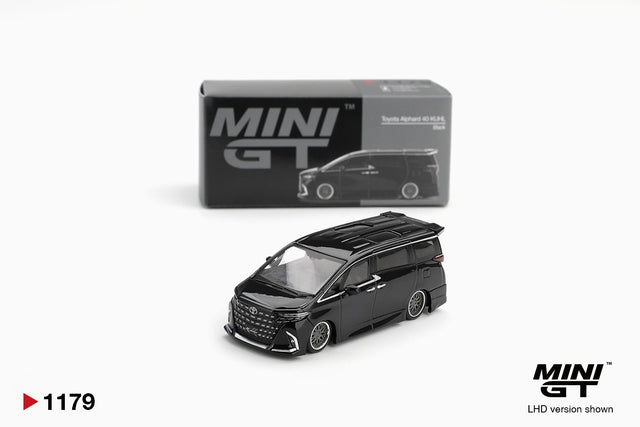 Mini GT Toyota Alphard 40 KUHL Black diecast model with lowered bodywork, silver multi spoke wheels and large front grille, displayed in front of its MINI GT collector box. LHD version shown.