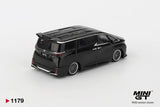 Rear three quarter view of Mini GT Toyota Alphard 40 KUHL Black RHD showing the rear roof spoiler, Toyota badge, Alphard lettering, custom rear bumper and silver multi spoke wheels.