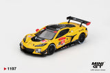 Mini GT Chevrolet Corvette Z06 GT3.R No.4 Corvette Racing front three quarter view showing the yellow bonnet, American flag graphic, black roof, red mirrors, front splitter and racing number 4