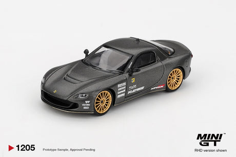 Mini GT Mazda RX-7 RE-Amemiya Matsukiyo KOKU 3 Rotor NA-7 front three quarter view showing the carbon effect bonnet, low front bumper, gold wheels and white sponsor graphics