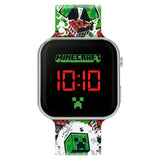 Minecraft Creeper TNT LED Watch close view with red digital time display, silver square case, Creeper icon and printed TNT strap
