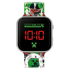 Minecraft Creeper TNT LED Watch close view with red digital time display, silver square case, Creeper icon and printed TNT strap