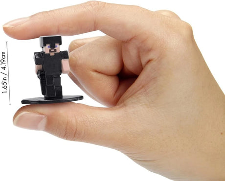 Minecraft Nano MetalFigs black-clothed figure held between two fingers, with a height measurement of 4.19 cm shown beside it.